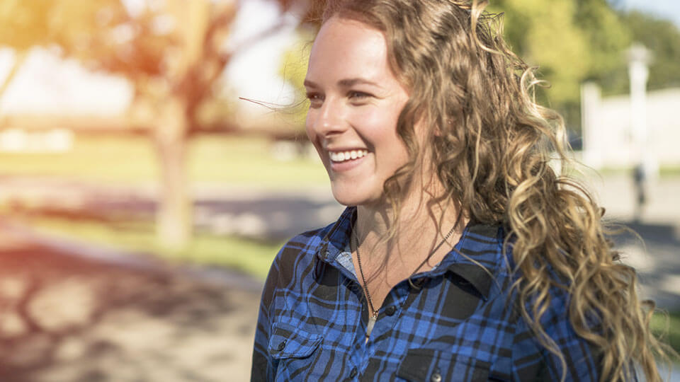 Smiling woman on a farm - Foster Farms